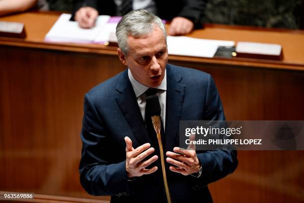 French Economy Minister Bruno Le Maire gestures as he speaks during a session of questions to the government at the French National Assembly, in...