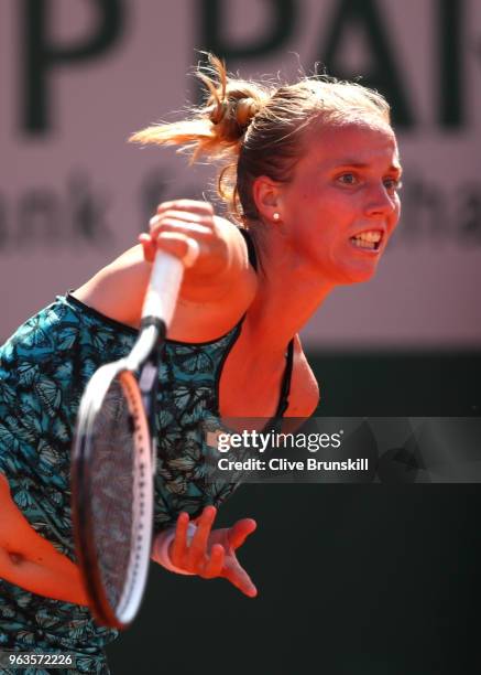 Richel Hogenkamp of the Netherlands plays a forehand during the ladies singles first round match against Maria Sharapova of Russia during day three...