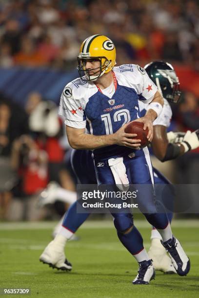 Quarterback Aaron Rodgers of the Green Bay Packers drops back with the ball during the 2010 AFC-NFC Pro Bowl at Sun Life Stadium on January 31, 2010...