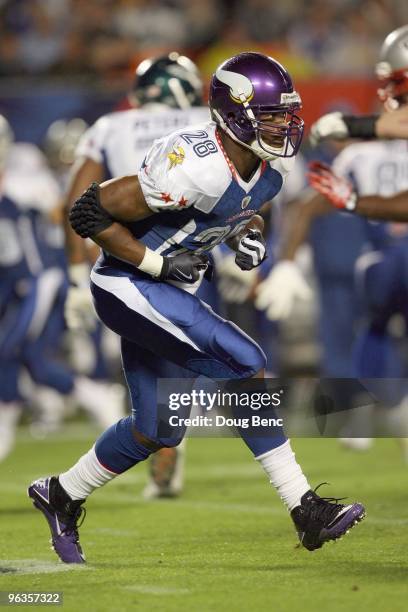 Adrian Peterson of the Minnesota Vikings runs his route during the 2010 AFC-NFC Pro Bowl at Sun Life Stadium on January 31, 2010 in Miami Gardens,...