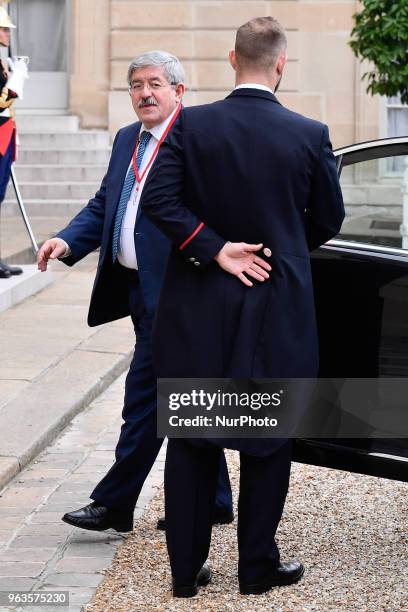 Algerian Prime Minister Ahmed Ouyahia arrives to attend an international conference on Libya at the Elysee Palace on May 29 in Paris, France. The...