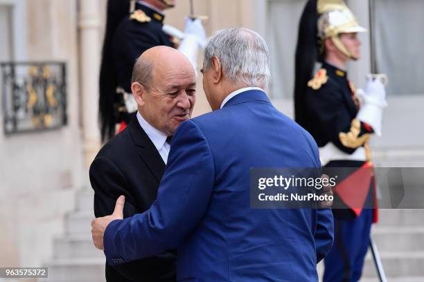 French Minister of Europe and Foreign Affairs Jean-Yves Le Drian welcomes Military commander who dominates eastern Libya, Khalifa Haftar at the...