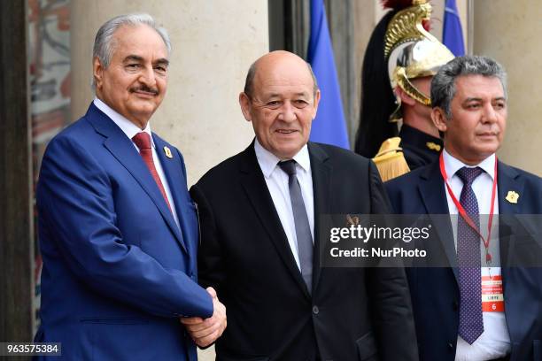 French Minister of Europe and Foreign Affairs Jean-Yves Le Drian welcomes Military commander who dominates eastern Libya, Khalifa Haftar at the...