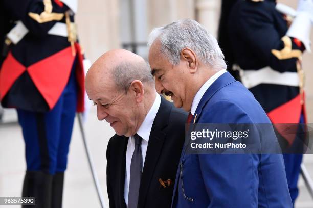 French Minister of Europe and Foreign Affairs Jean-Yves Le Drian welcomes Military commander who dominates eastern Libya, Khalifa Haftar at the...