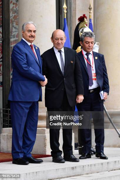 French Minister of Europe and Foreign Affairs Jean-Yves Le Drian welcomes Military commander who dominates eastern Libya, Khalifa Haftar at the...