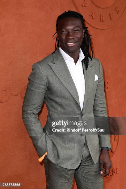 Soccer player Bafe Gomis attends the 2018 French Open - Day Three at Roland Garros on May 29, 2018 in Paris, France.