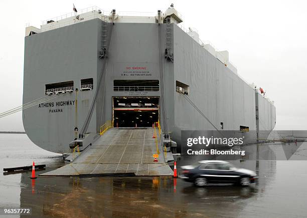 Volkswagen AG vehicle is unloaded from a transport ship at the Georgia Ports Authority Colonel's Island facility in Brunswick, Georgia, on Tuesday...