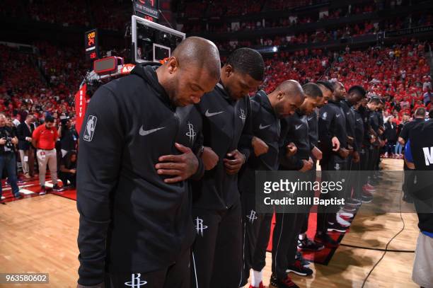 Tucker and Joe Johnson of the Houston Rockets stand for the National Anthem before Game Seven of the Western Conference Finals against the Golden...