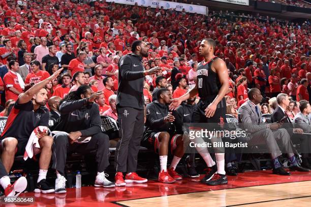 Tarik Black and Eric Gordon of the Houston Rockets high five in Game Seven of the Western Conference Finals against the Golden State Warriors during...