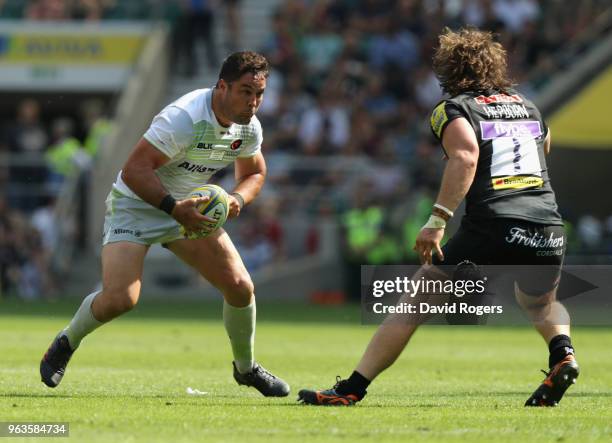 Brad Barritt of Saracens takes on Alex Hepburn during the Aviva Premiership Final between Exeter Chiefs and Saracens at Twickenham Stadium on May 26,...