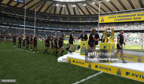The defeated Exeter Chiefs side collect their medals during the Aviva Premiership Final between Exeter Chiefs and Saracens at Twickenham Stadium on...