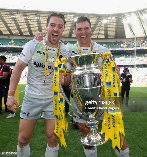 Chris Wyles and Schalk Brits of Saracens celebrates their victory during the Aviva Premiership Final between Exeter Chiefs and Saracens at Twickenham...