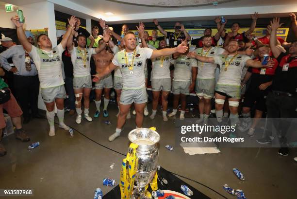 Richard Barrington of Saracens leads the celebrations after their victory during the Aviva Premiership Final between Exeter Chiefs and Saracens at...