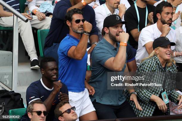 Serena Williams 's husband Alexis Ohanian and trainer Patrick Moratoglou attend the 2018 French Open - Day Three at Roland Garros on May 29, 2018 in...