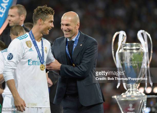 Real Madrid coach Zinedine Zidane celebrates with Cristiano Ronaldo after the UEFA Champions League Final between Real Madrid and Liverpool at NSC...