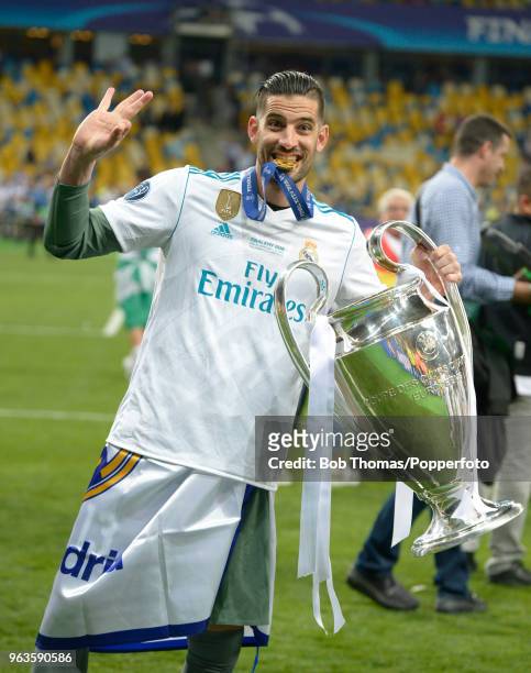 Kiko Casilla of Real Madrid celebrates with the trophy after the UEFA Champions League Final between Real Madrid and Liverpool at NSC Olimpiyskiy...