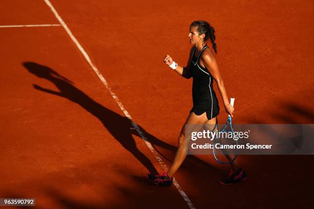 Julia Georges of Germany celebrates during the ladies singles first round match against Dominika Cibulkova of Slovakia during day three of the 2018...