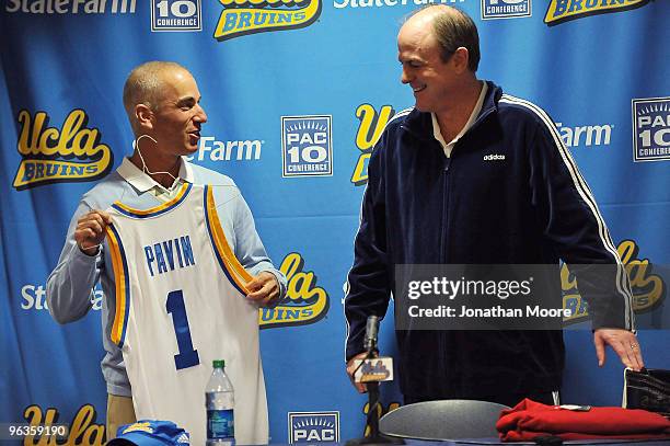 Head Basketball Coach Ben Howland presents Ryder Cup Captain Corey Pavin with a personalized UCLA Bruin basketball jersey at UCLA on February 2, 2010...