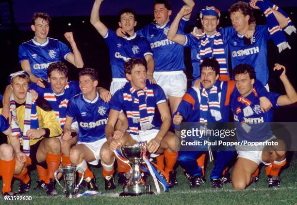 Terry Butcher and the Rangers team celebrate after the Skol Cup Final between Rangers and Celtic at Hampden Park on October 26, 1986 in Glasgow,...