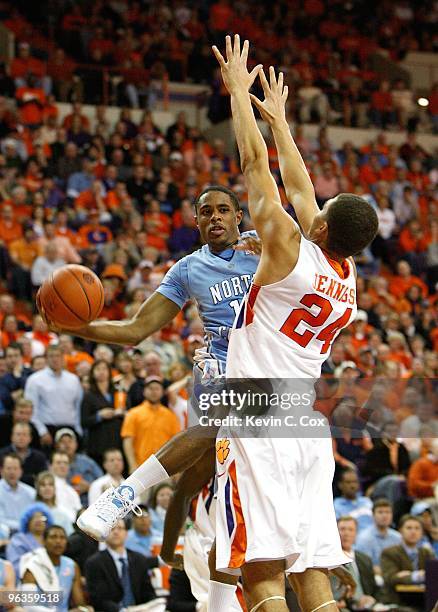 Larry Drew II of the North Carolina Tar Heels against Milton Jennings of the Clemson Tigers at Littlejohn Coliseum on January 13, 2010 in Clemson,...