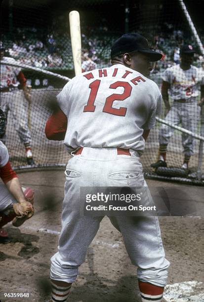 First Baseman Bill White of the St. Louis Cardinals in the batting cage during batting practice before a circa 1960's Major League Baseball game....