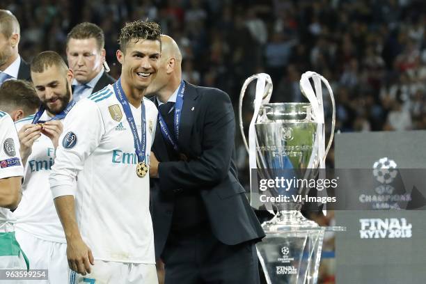 Karim Benzema of Real Madrid, Cristiano Ronaldo of Real Madrid, coach Zinedine Zidane of Real Madrid during the UEFA Champions League final between...