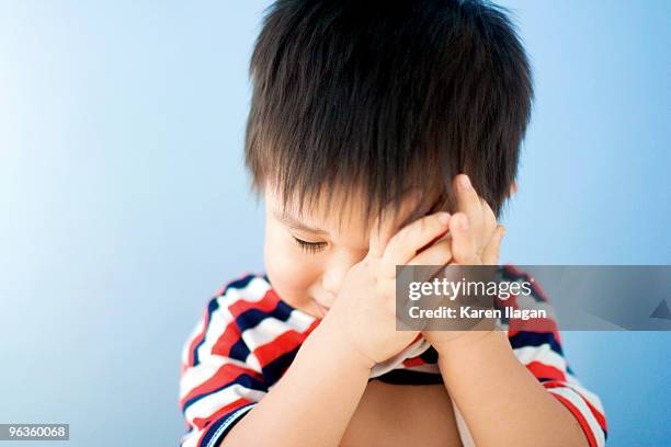 poor little crying toddler boy - kid rubbing eyes stock pictures, royalty-free photos & images
