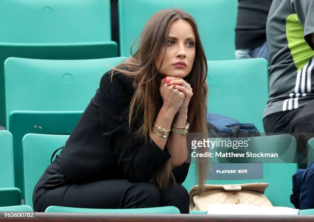Ester Berdych Satorova, wife of Thomas Berdych of Czech Republic watches on as he plays his mens singles first round match against Jeremy Chardy of...