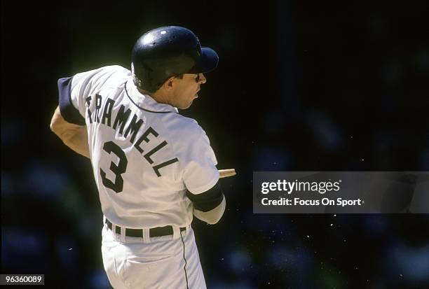 S: Shortstop Alan Trammell of the Detroit Tigers breaking his bat on the swing, watches the flight of his ball during a circa late 1980's Major...