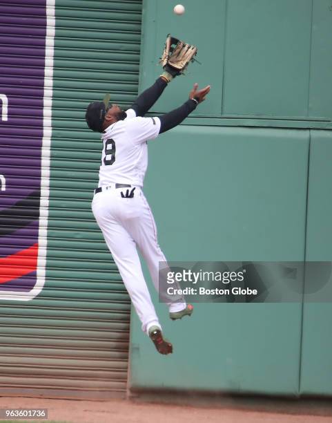 Boston Red Sox player Jackie Bradley Jr. Robs Toronto Blue Jays' Kendrys Morales of an extra base hit with a catch during the sixth inning. The...