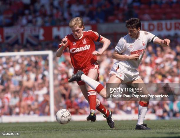 Steve Staunton of Liverpool takes on Tommy Gaynor of Nottingham Forest during the rearranged FA Cup Semi Final between Liverpool and Nottingham...