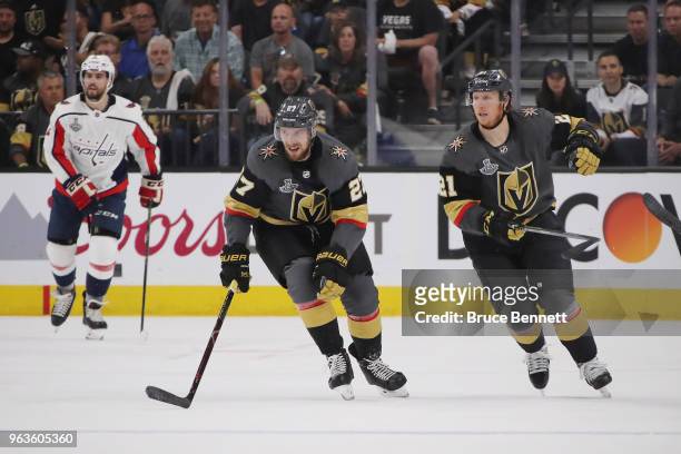 Shea Theodore and Cody Eakin of the Vegas Golden Knights skate against the Washington Capitals in Game One of the 2018 NHL Stanley Cup Final at...