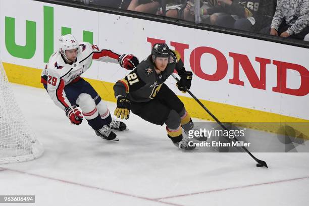 Cody Eakin of the Vegas Golden Knights skates against Christian Djoos of the Washington Capitals in Game One of the 2018 NHL Stanley Cup Final at...