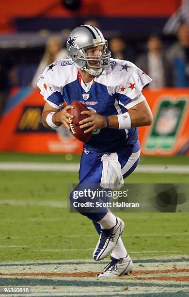 Quarterback Tony Romo of the NFC's Dallas Cowboys looks to make a pass play during the 2010 AFC-NFC Pro Bowl game at Sun Life Stadium on January 31,...