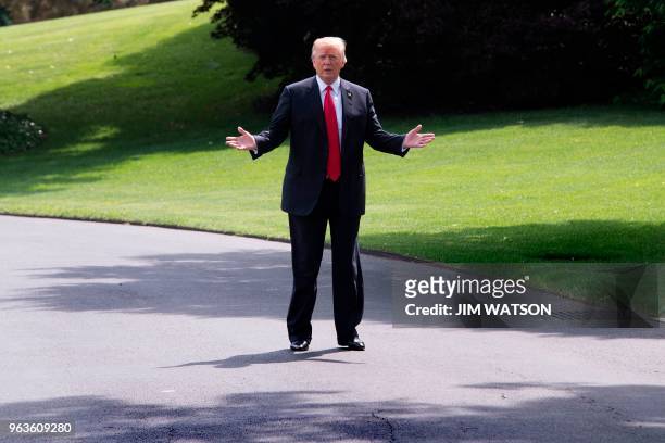 President Donald Trump speaks to the press as he departs the White House in Washington, DC, for Nashville, Tennessee, on May 29, 2018.
