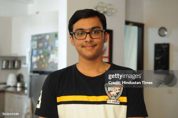 All India topper Prakhar Mittal pose for a picture after Central Board of Secondary Education declared class 10th results, on May 29, 2018 in...