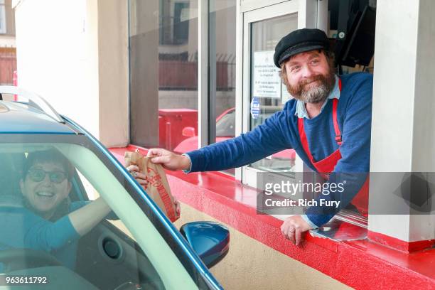 Zach Galifianakis serves customers during the FYC event for FX's "Baskets" at Arby's on May 29, 2018 in Los Angeles, California.