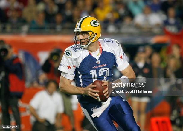 Aaron Rodgers of the NFC's Green Bay Packers scrambles out of the pocket during the 2010 AFC-NFC Pro Bowl game at Sun Life Stadium on January 31,...