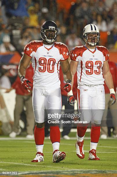 Mario Williams and Kyle Vanden Bosch of the AFC's Houston Texans and Tennessee Titans look on during the 2010 AFC-NFC Pro Bowl game at Sun Life...