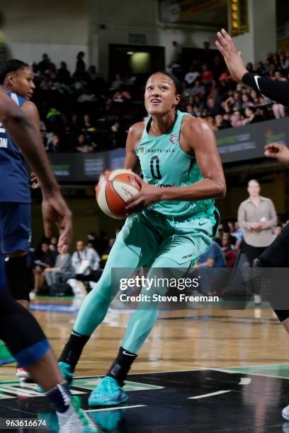 Marissa Coleman of the New York Liberty handles the ball against the Minnesota Lynx on May 25, 2018 at Westchester County Center in White Plains, New...