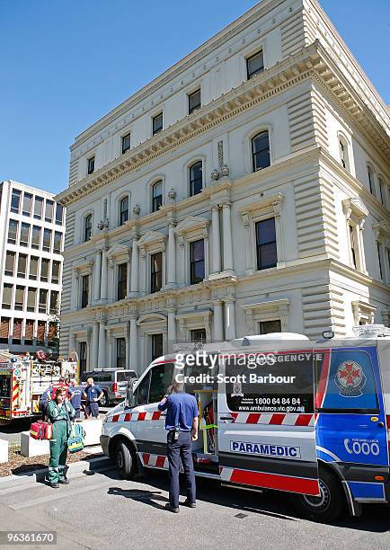 Victorian firefighters and emergency services work outside of the Victorian Premier's office after a suspect package containing an unidentified...