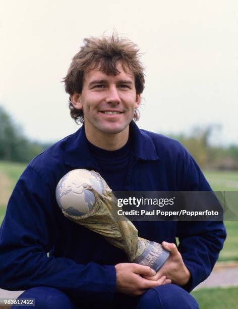 Bryan Robson of England with a Lladro replica World Cup, circa 1986.