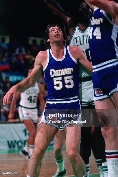 Kiki Vandeweghe of the Denver Nuggets boxes out for the rebound against the Boston Celtics during a game played in 1981 at the Boston Garden in...