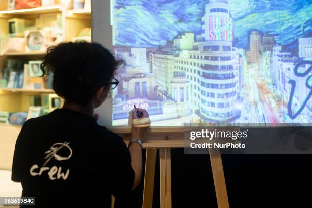 Performance of two Spanish painters where they show how they did their work during the presentation of the 'Loving Pablo' DVD at El Corte Ingles de...