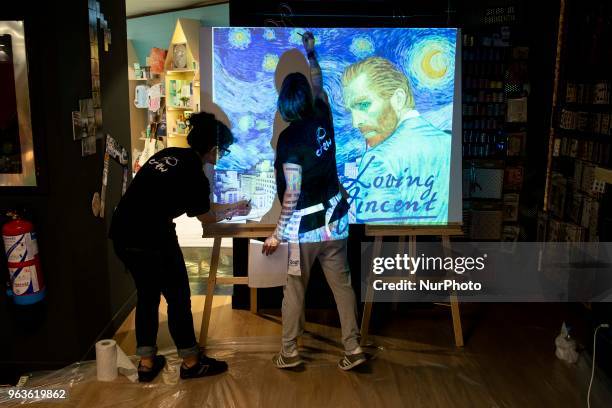 Performance of two Spanish painters where they show how they did their work during the presentation of the 'Loving Pablo' DVD at El Corte Ingles de...