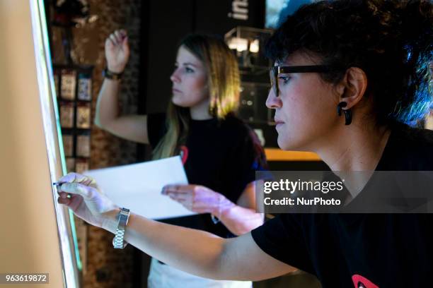 Performance of two Spanish painters where they show how they did their work during the presentation of the 'Loving Pablo' DVD at El Corte Ingles de...