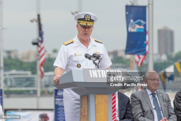 Navy Admiral Christopher Grady speaks during Memorial Day celebration at Intrepid Sea, Air & Space Museum.