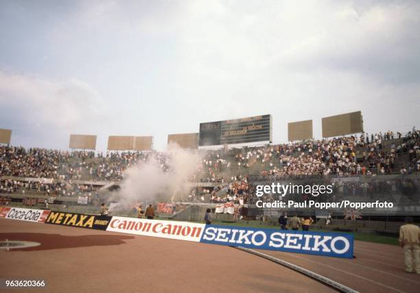 Tear gas spreads across the stand following crowd trouble during the UEFA Euro 1980 group game between Belgium and England at the Stadio Olimpico...