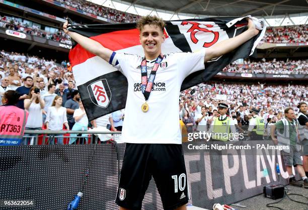 Fulham's Tom Cairney celebrates after the final whistle during the Sky Bet Championship Final at Wembley Stadium, London.