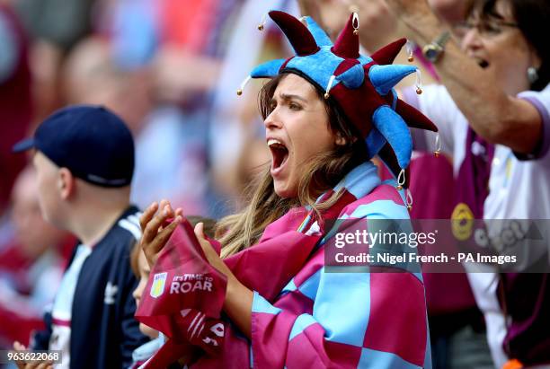 Aston Villa fans in the stands show their support during the Sky Bet Championship Final at Wembley Stadium, London.